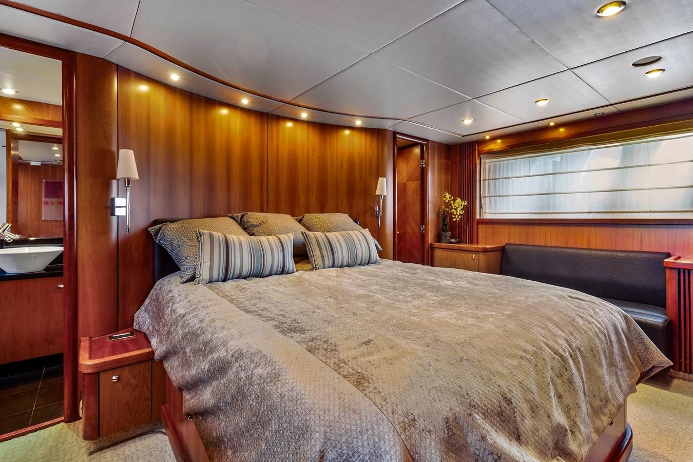 a bed in a room aboard HER WAY Yacht for Sale