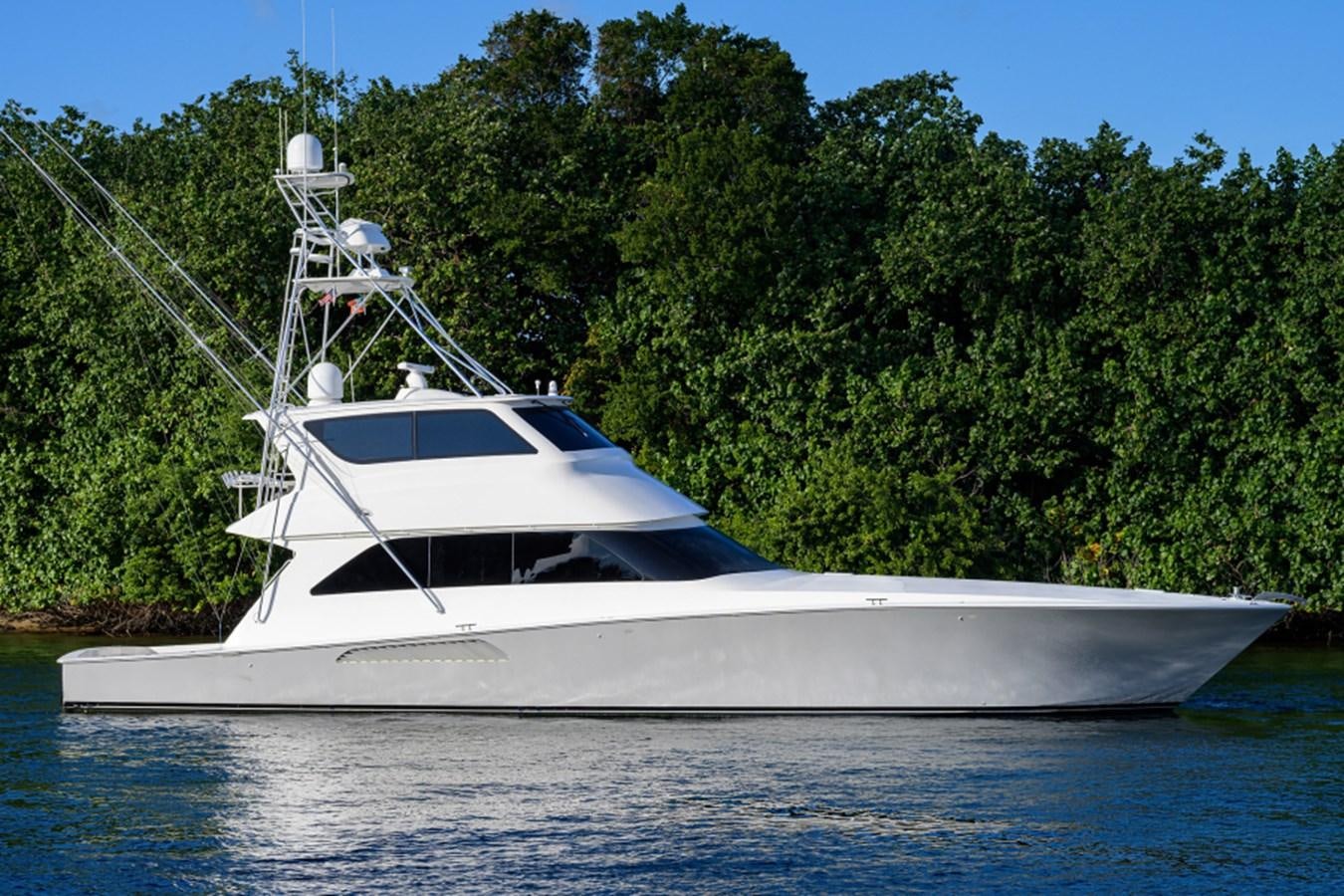 a white boat on the water aboard KNOT RACING Yacht for Sale