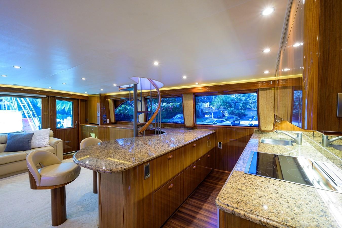 a kitchen with a bar and a bar aboard KNOT RACING Yacht for Sale