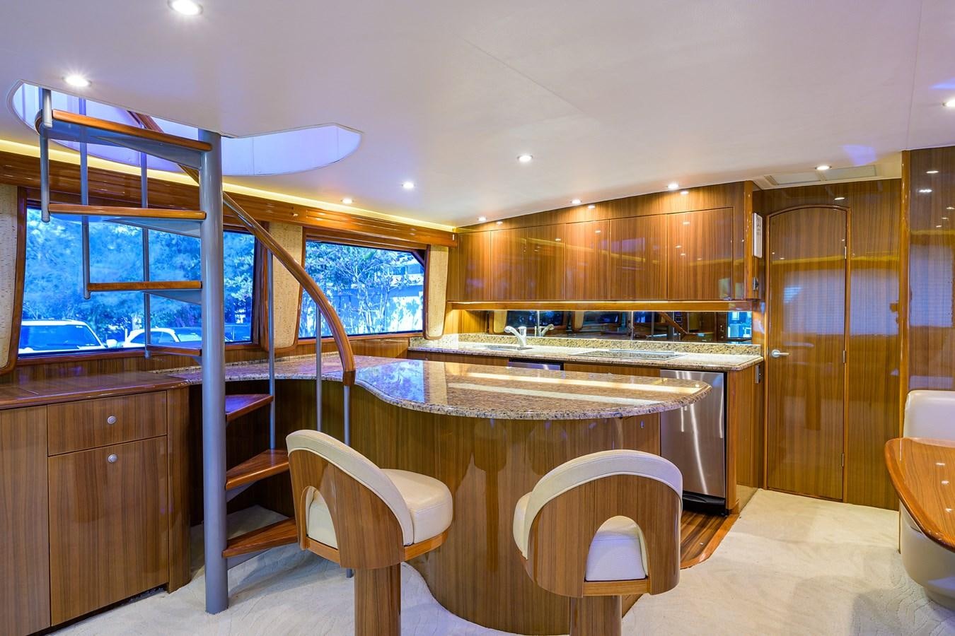 a kitchen with a bunk bed aboard KNOT RACING Yacht for Sale