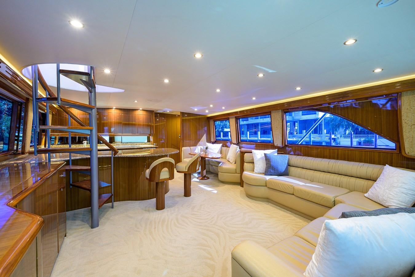 a living room with a large glass window aboard KNOT RACING Yacht for Sale