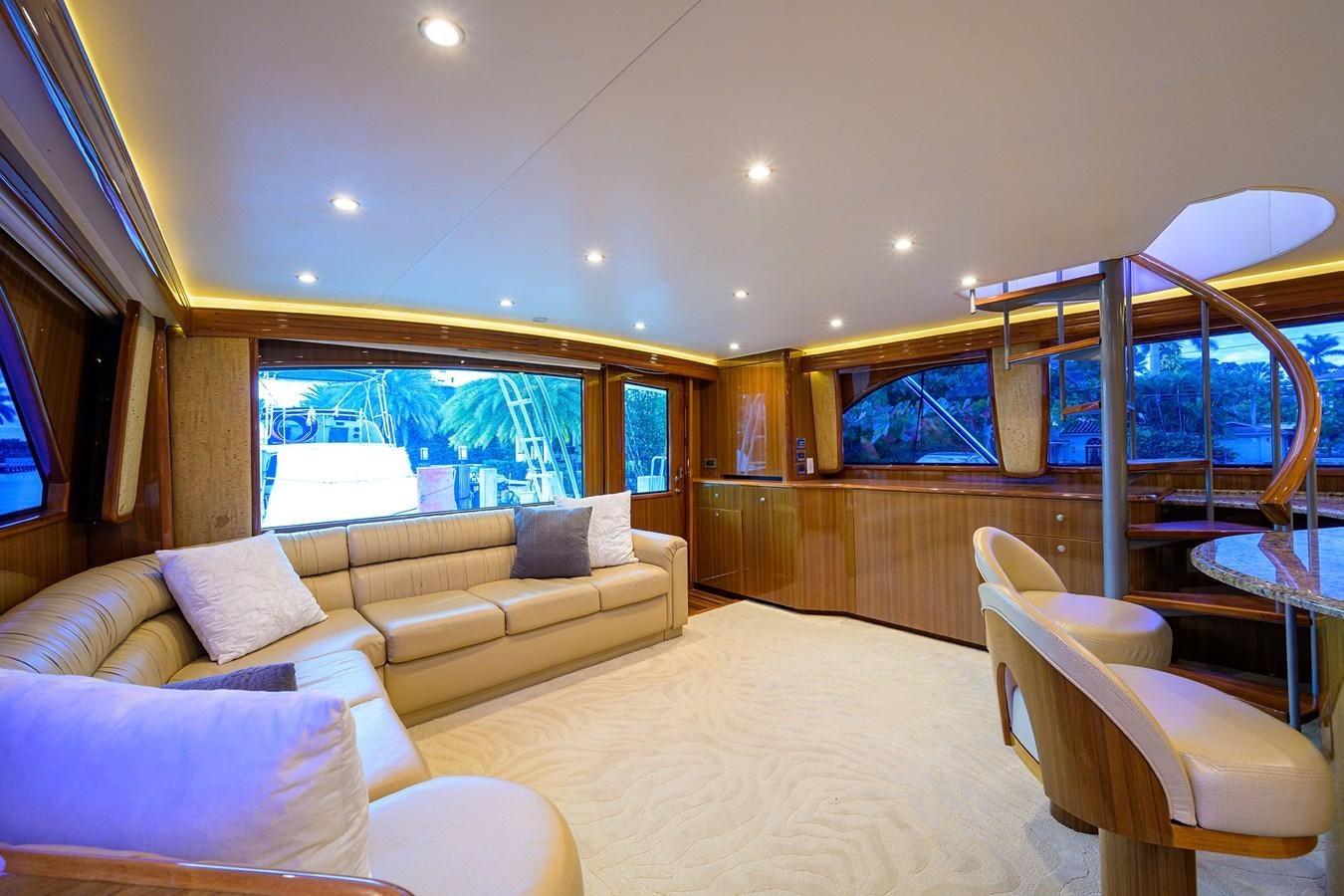 a living room with a large window aboard KNOT RACING Yacht for Sale