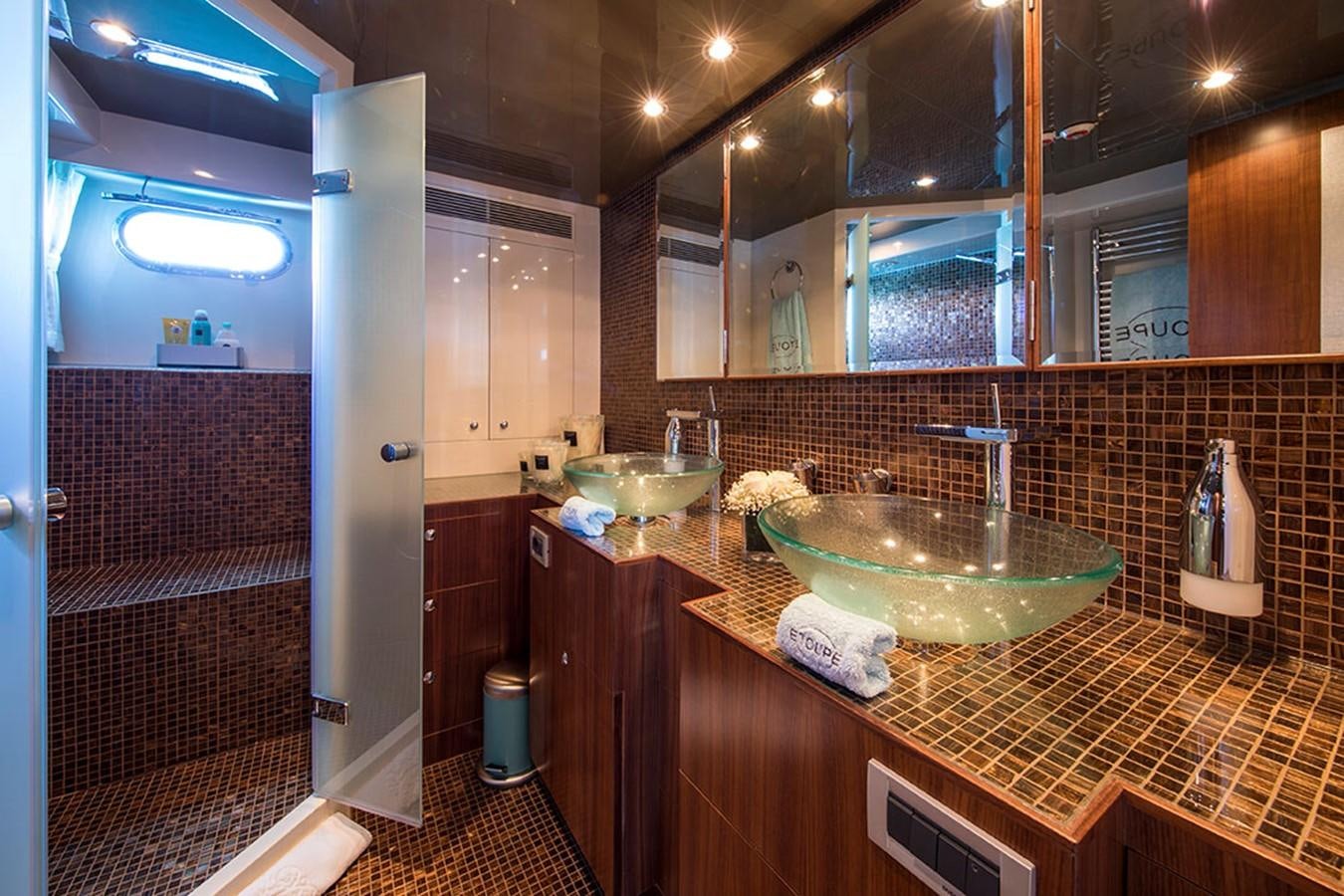 a bathroom with a sink and a mirror aboard ETOUPE Yacht for Sale