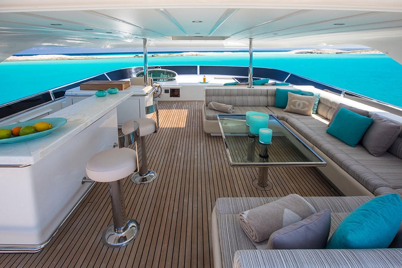 a room with a couch and a pool table aboard ETOUPE Yacht for Sale