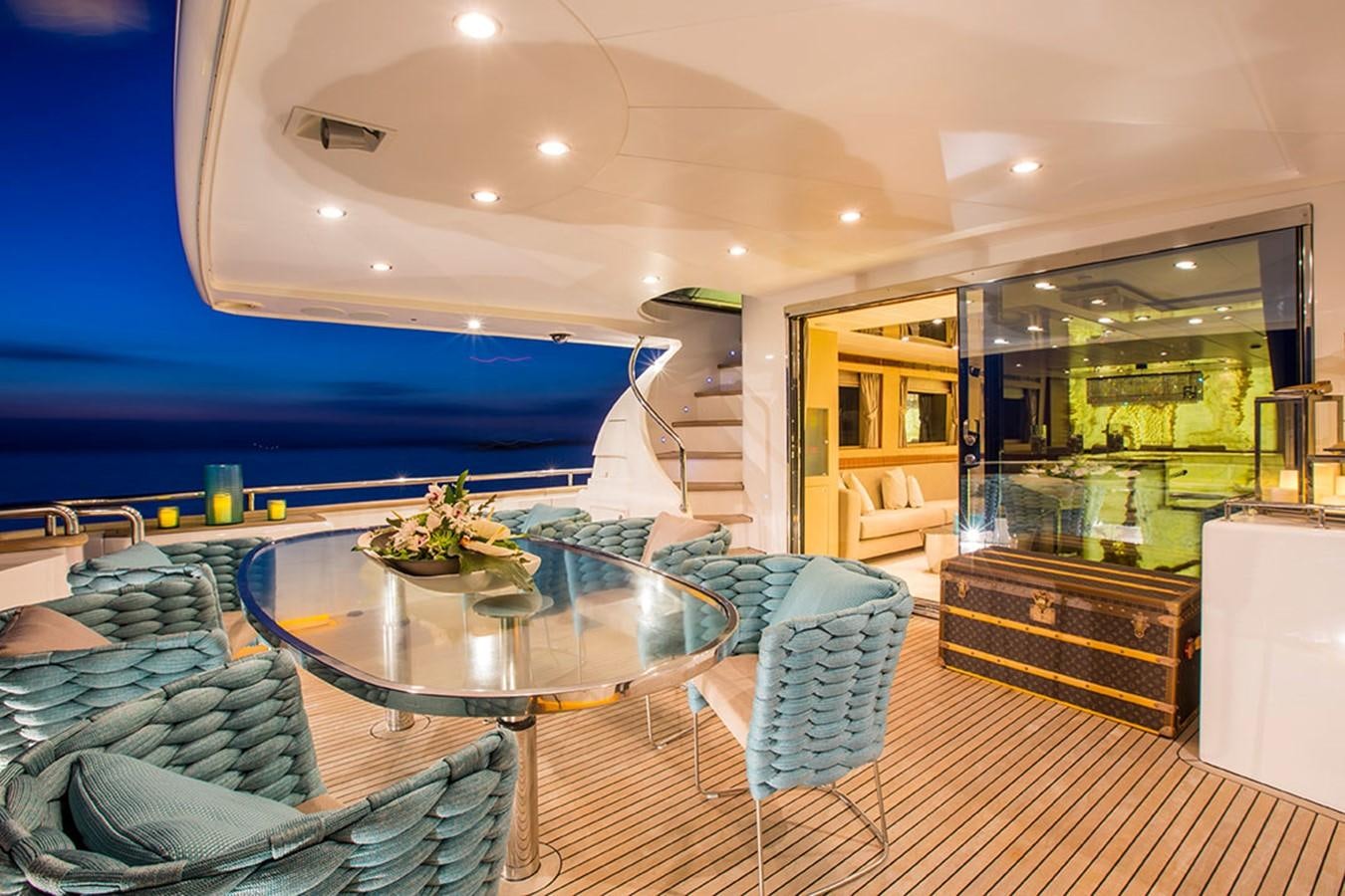 a large living room with a pool table and chairs aboard ETOUPE Yacht for Sale