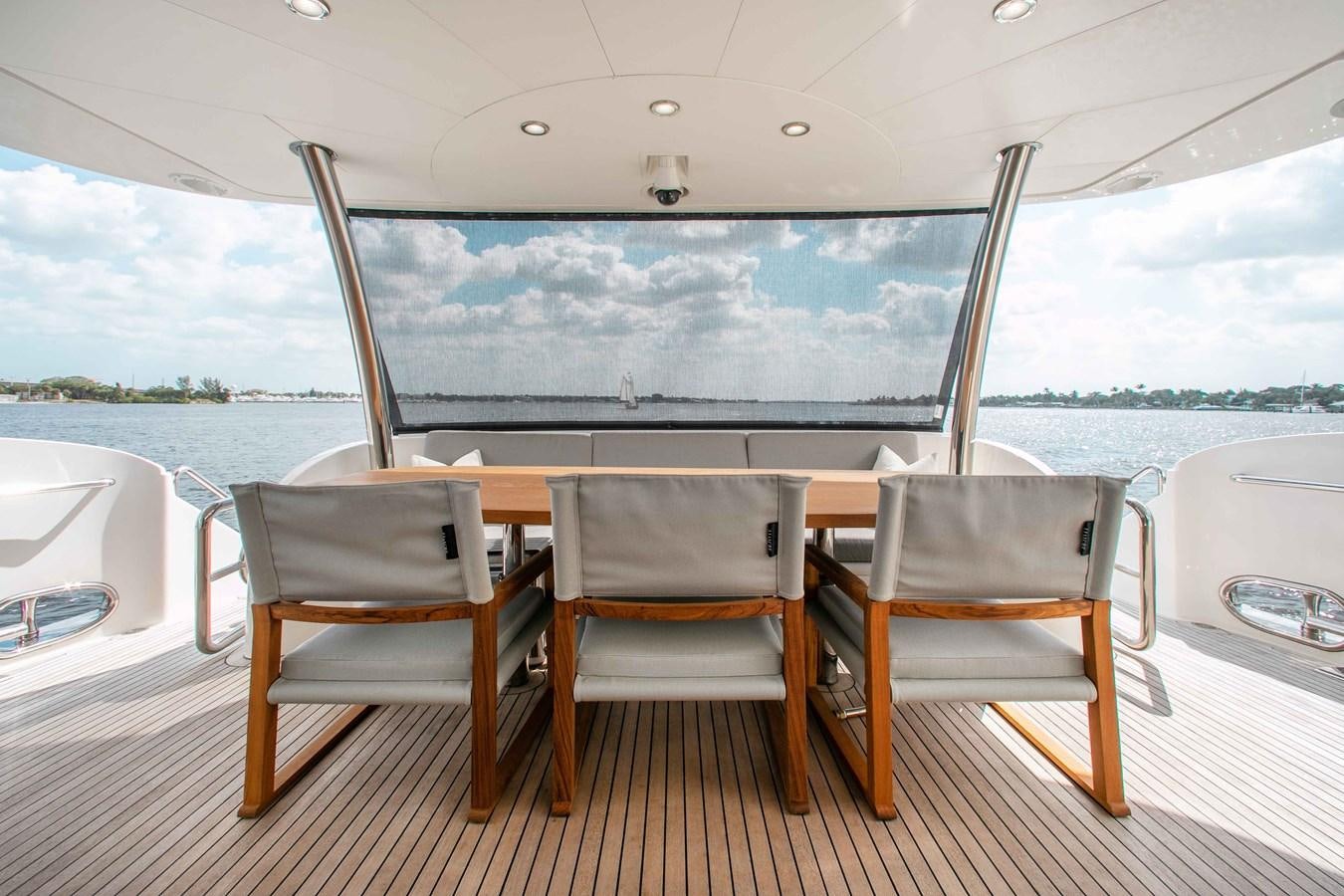 a table and chairs on a boat aboard ISLAND SOUL Yacht for Sale