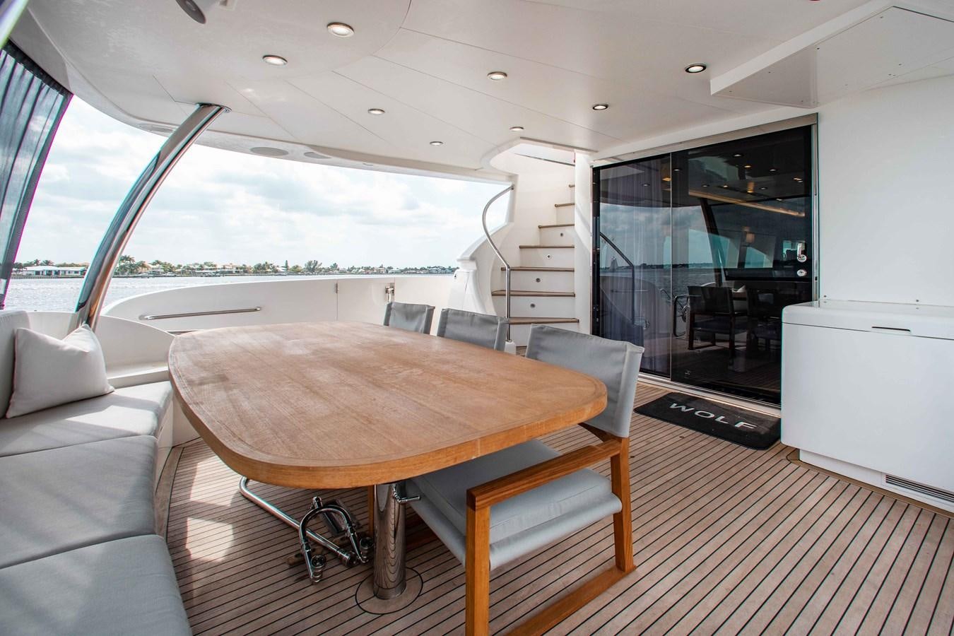 a large table with chairs around it aboard ISLAND SOUL Yacht for Sale