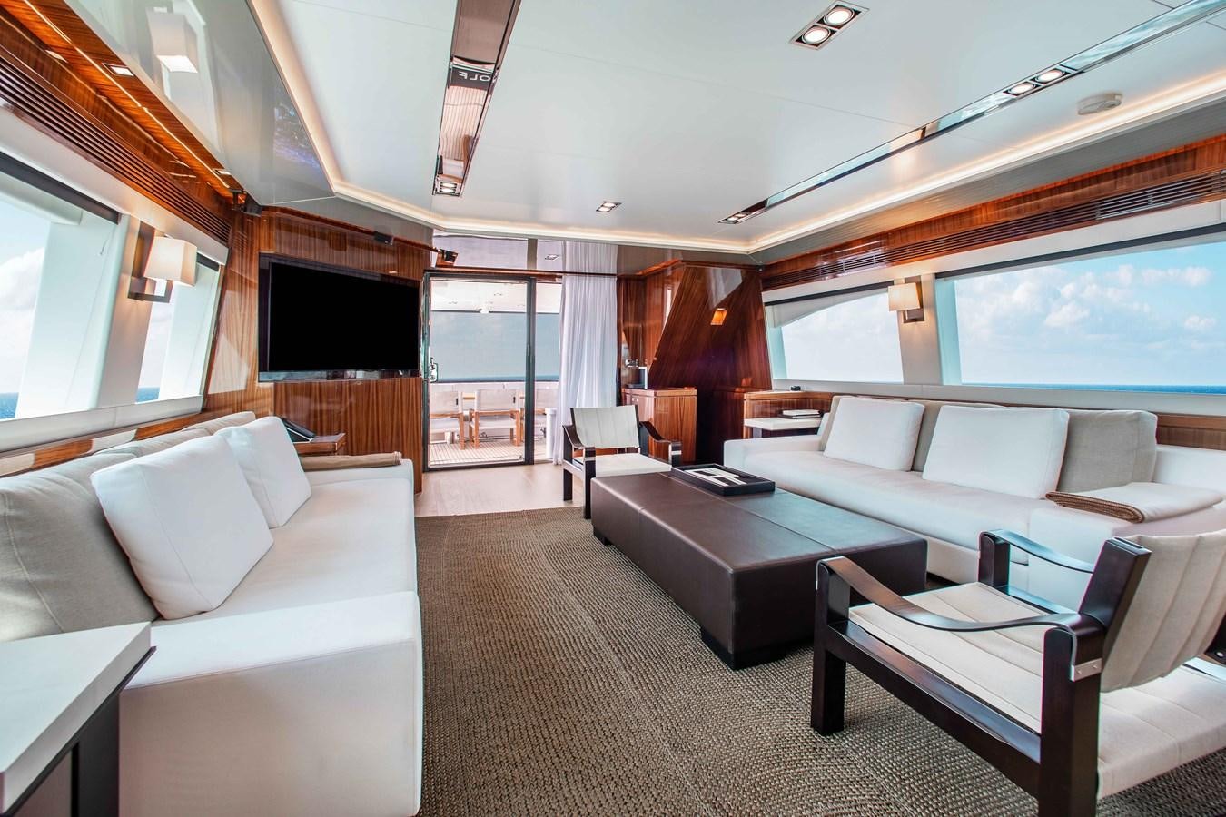 a living room with a large window aboard ISLAND SOUL Yacht for Sale