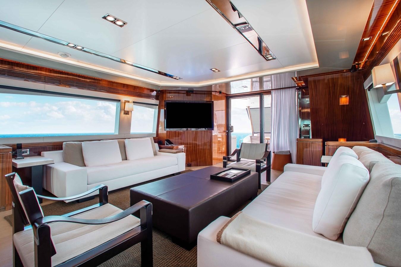 a living room with a large window aboard ISLAND SOUL Yacht for Sale