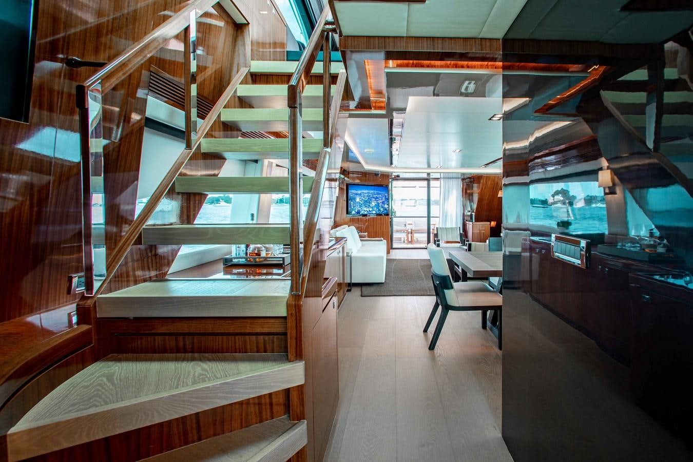 a room with wooden stairs aboard ISLAND SOUL Yacht for Sale
