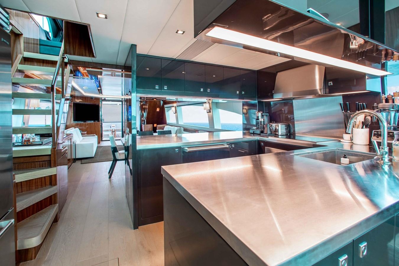 a large kitchen with a large island aboard ISLAND SOUL Yacht for Sale