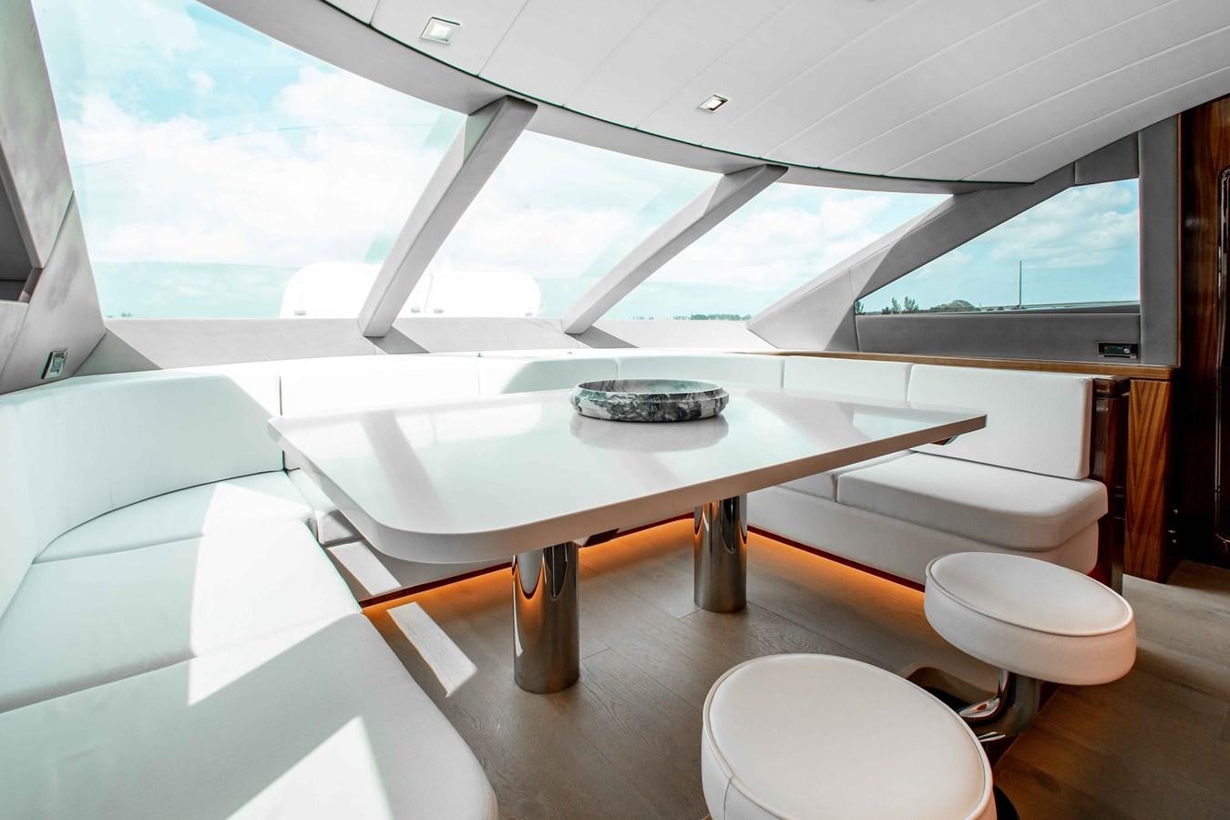 a table with a plate on it aboard ISLAND SOUL Yacht for Sale