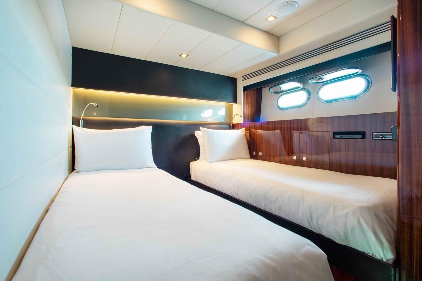 a couple of beds in a room aboard ISLAND SOUL Yacht for Sale
