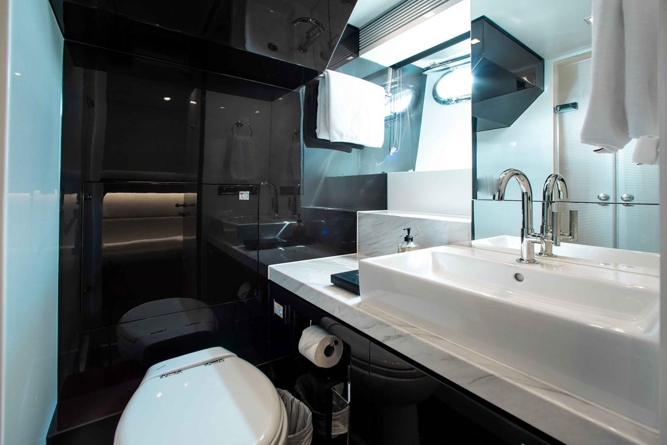 a bathroom with a sink and a toilet aboard ISLAND SOUL Yacht for Sale
