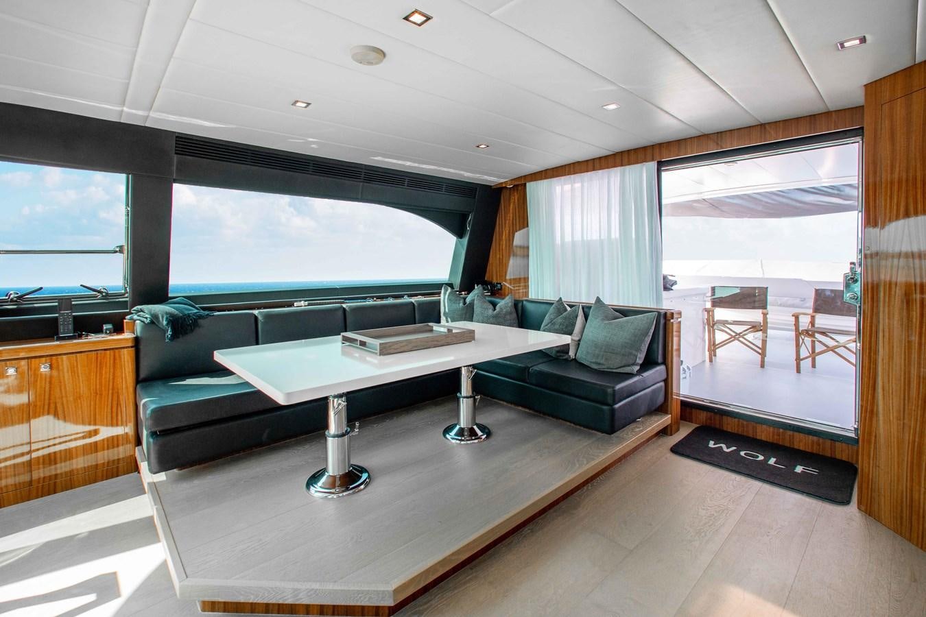 a living room with a large window aboard ISLAND SOUL Yacht for Sale