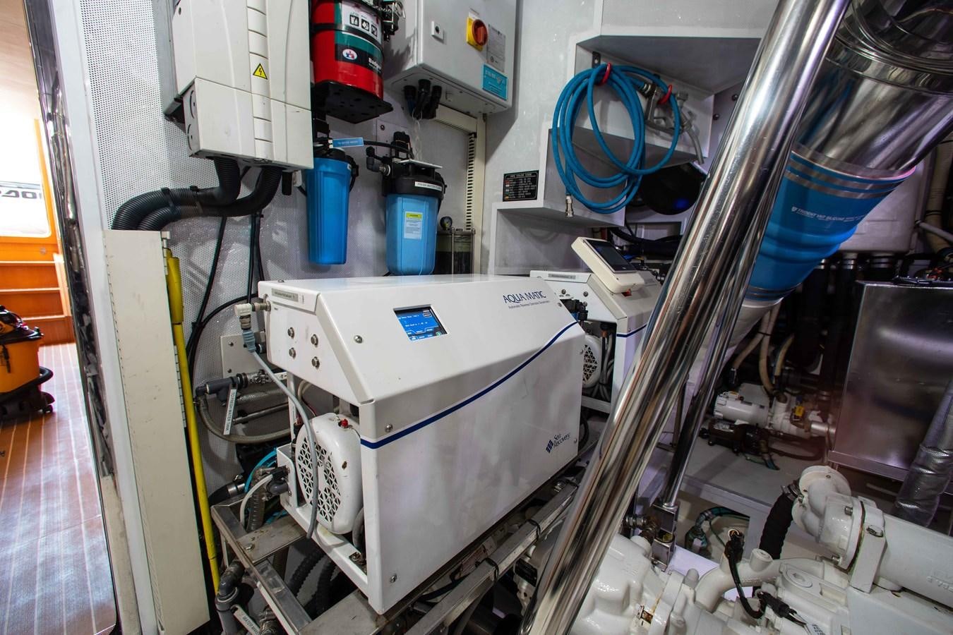 a machine in a room aboard ISLAND SOUL Yacht for Sale