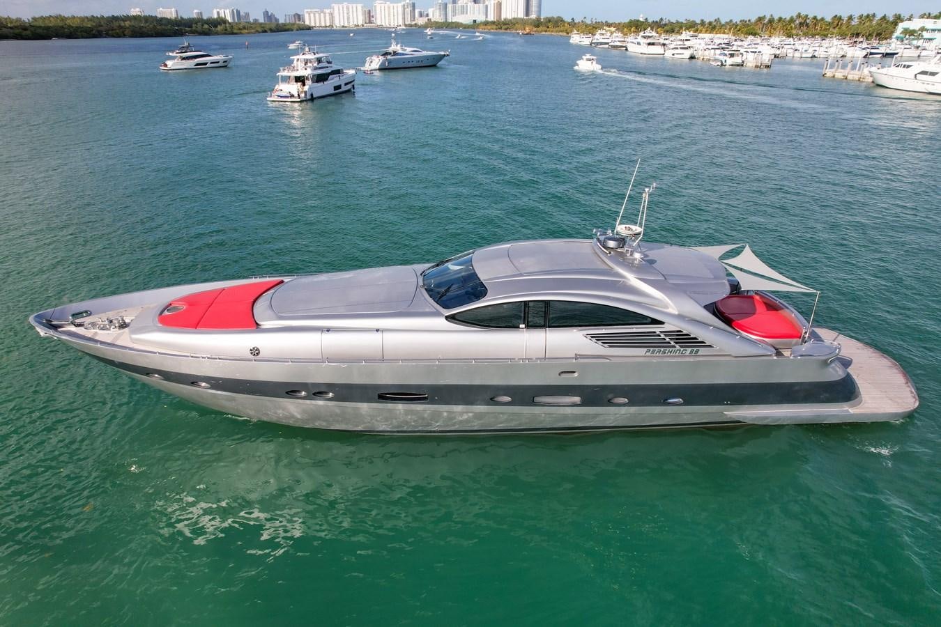 a white boat in the water aboard PERSHING 88/07 Yacht for Sale