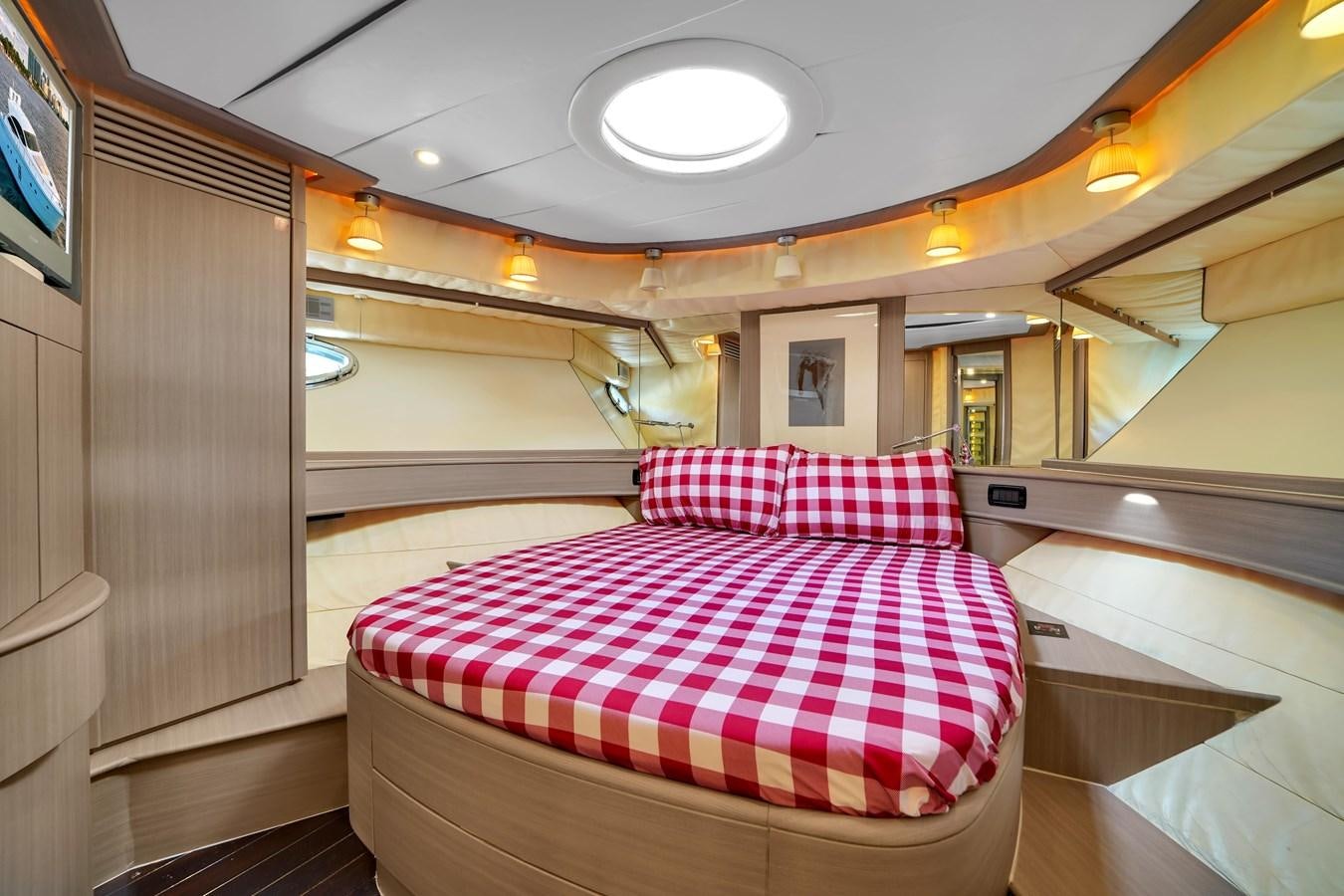 a bed in a train aboard PERSHING 88/07 Yacht for Sale