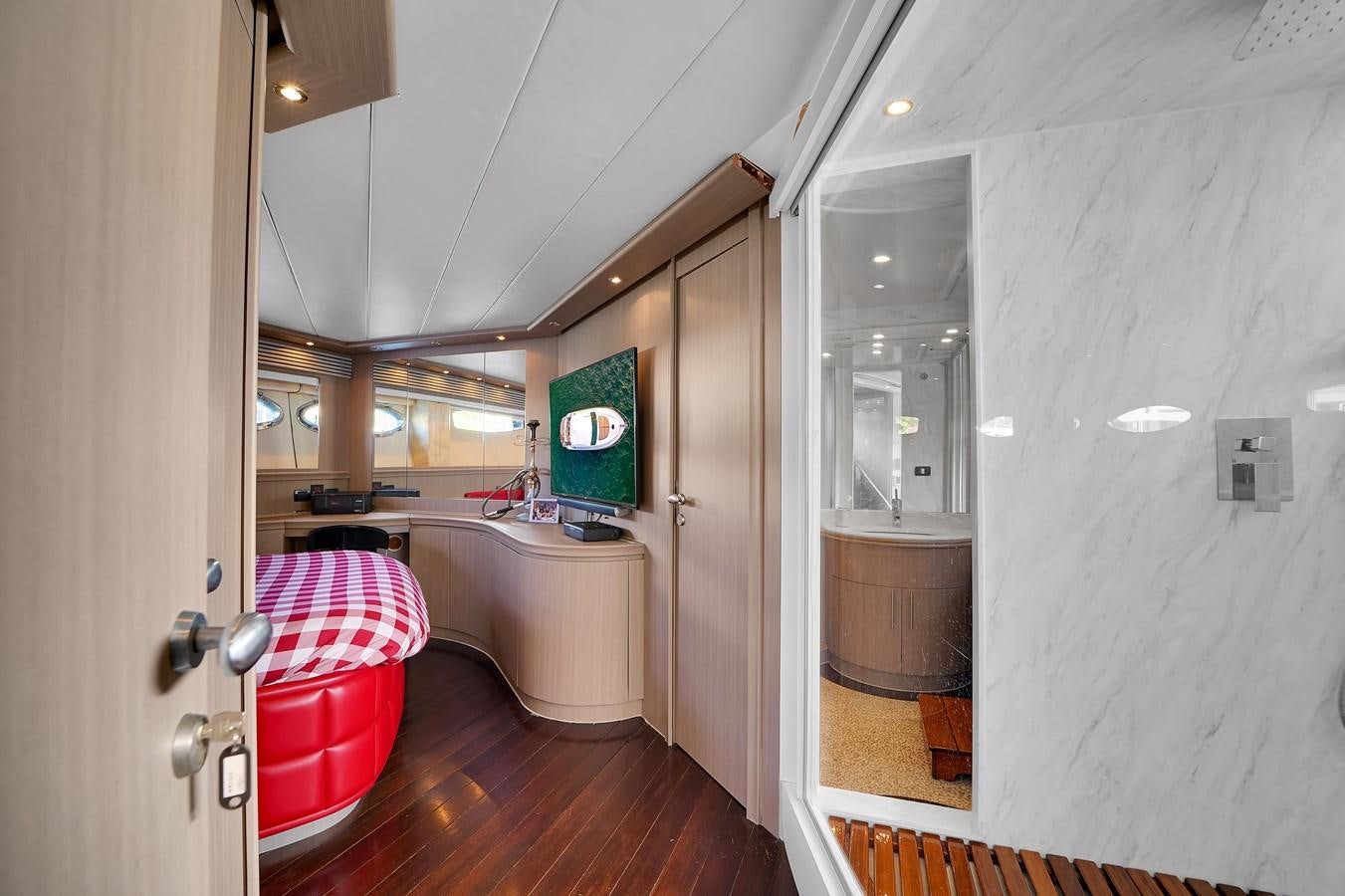 a bathroom with a tub and sink aboard PERSHING 88/07 Yacht for Sale
