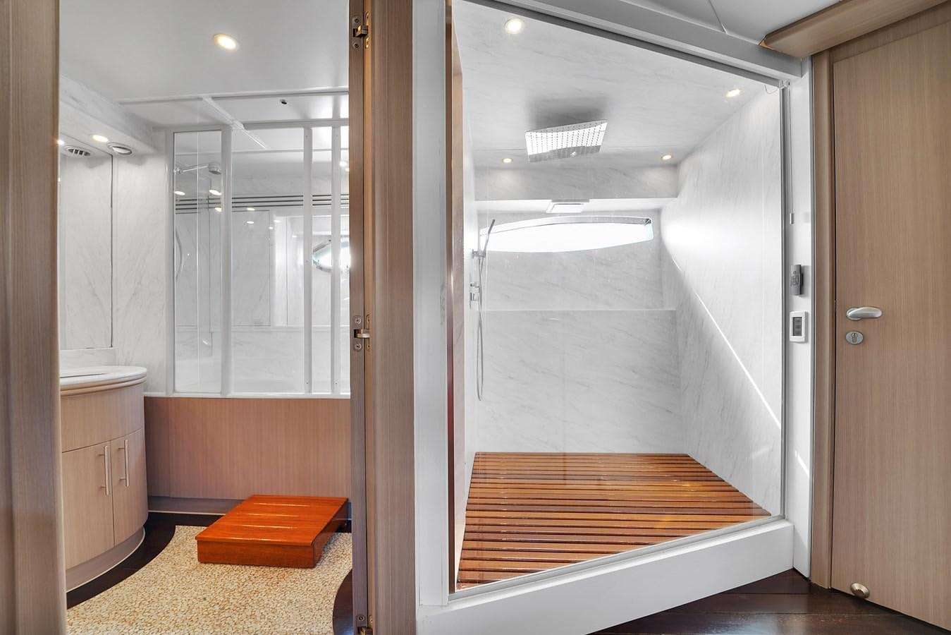 a bathroom with a shower and a sink aboard PERSHING 88/07 Yacht for Sale