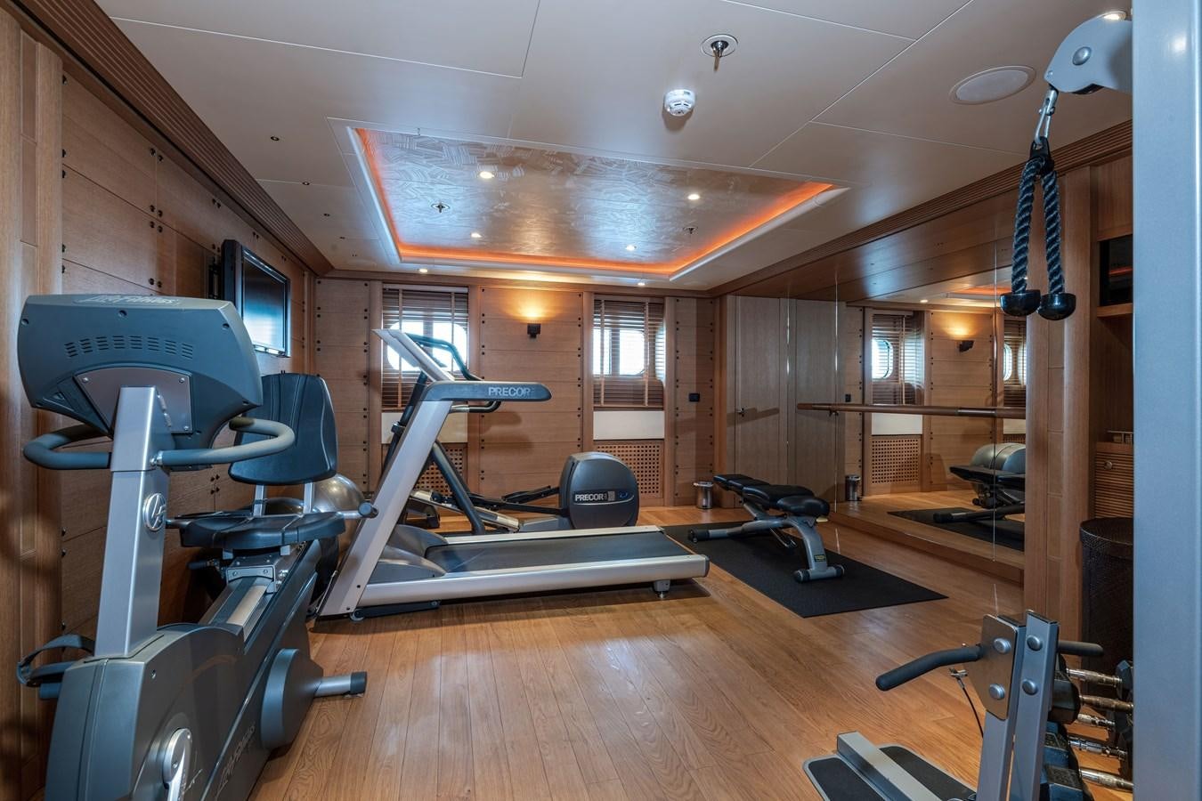 gym with exercise equipment aboard KOGO Yacht for Sale