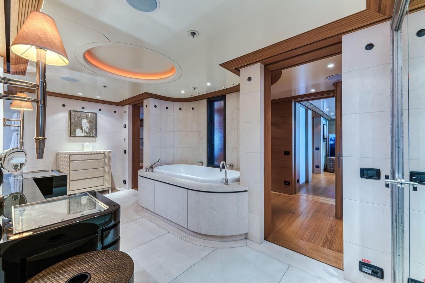 a bathroom with a large tub aboard KOGO Yacht for Sale