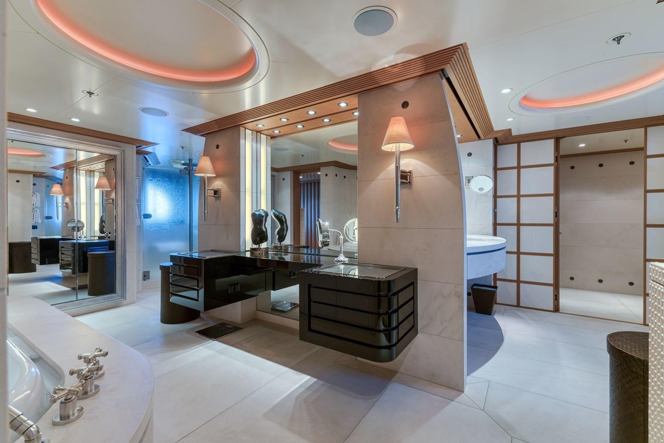 a bathroom with a large mirror aboard KOGO Yacht for Sale