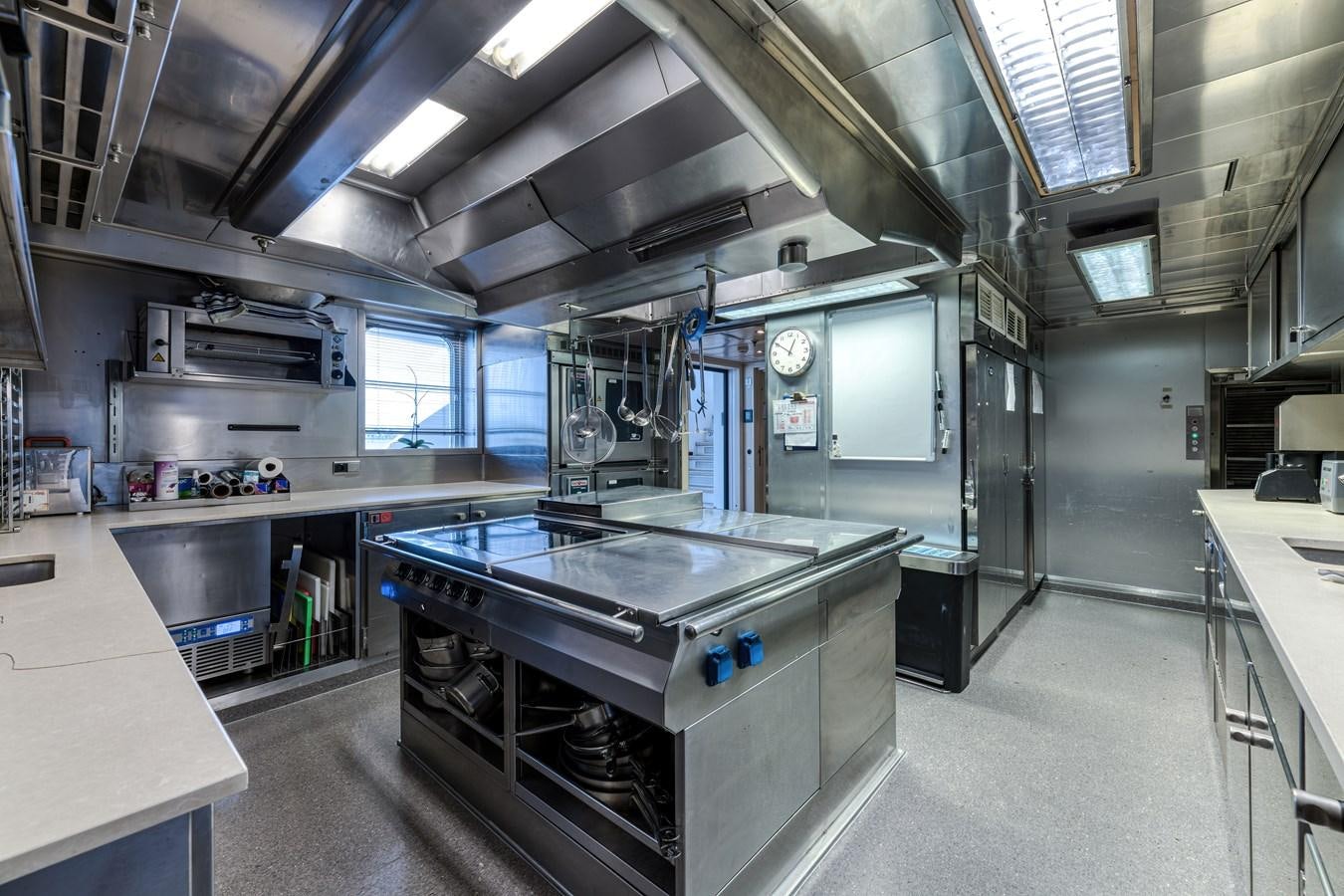 a large industrial kitchen aboard KOGO Yacht for Sale