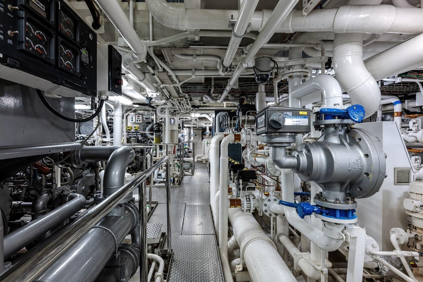 a room with machinery aboard KOGO Yacht for Sale