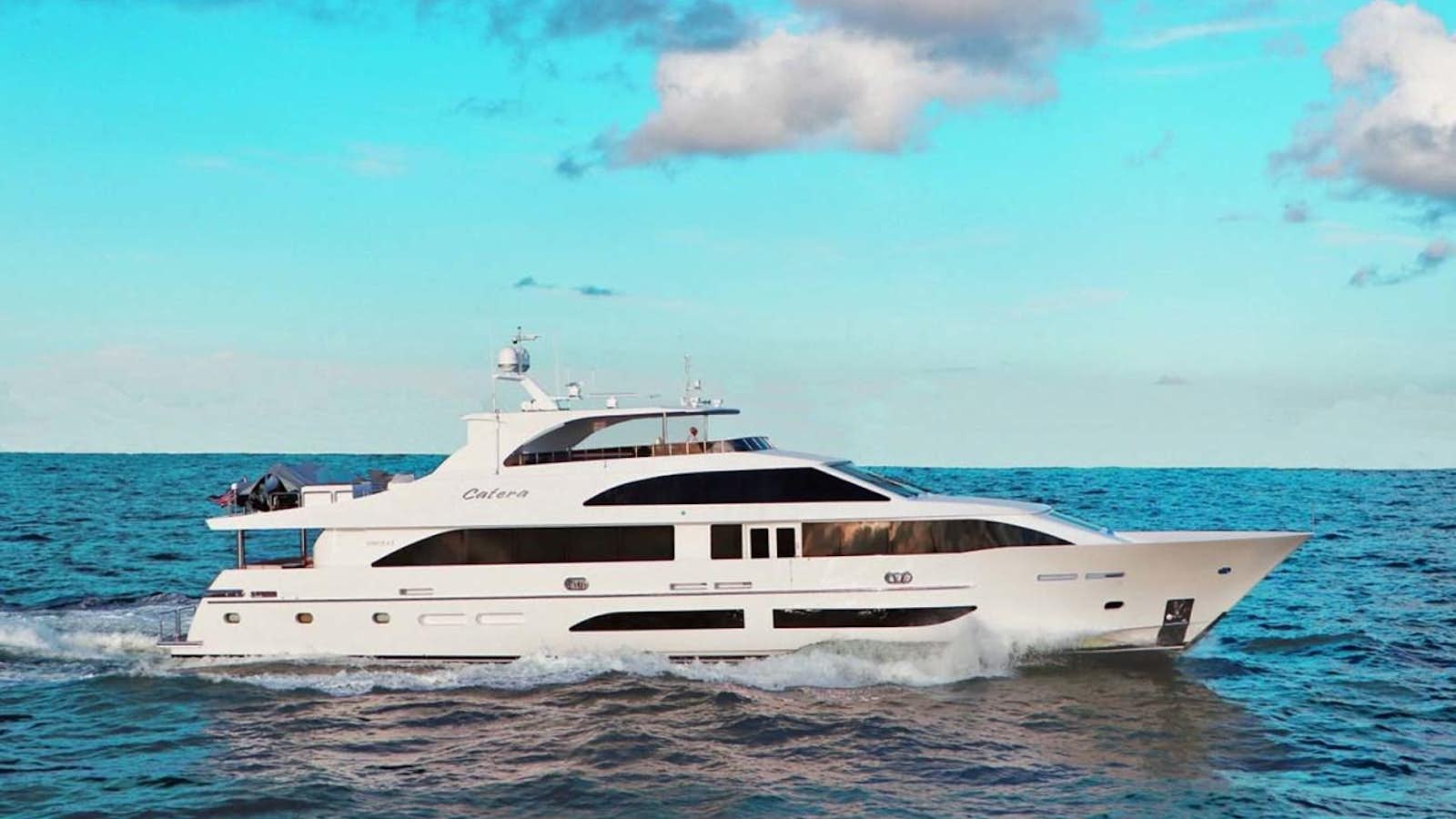 a white yacht on the water aboard G120 SIGNATURE SERIES Yacht for Sale