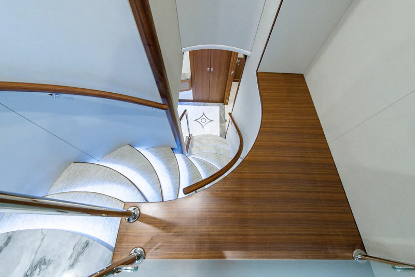 a wooden staircase with a white wall aboard G120 SIGNATURE SERIES Yacht for Sale