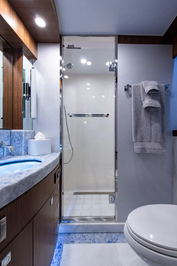 a bathroom with a shower and sink aboard G120 SIGNATURE SERIES Yacht for Sale