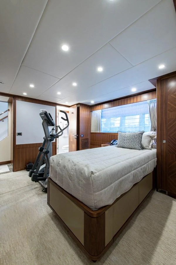a bedroom with a bed and a ladder aboard G120 SIGNATURE SERIES Yacht for Sale