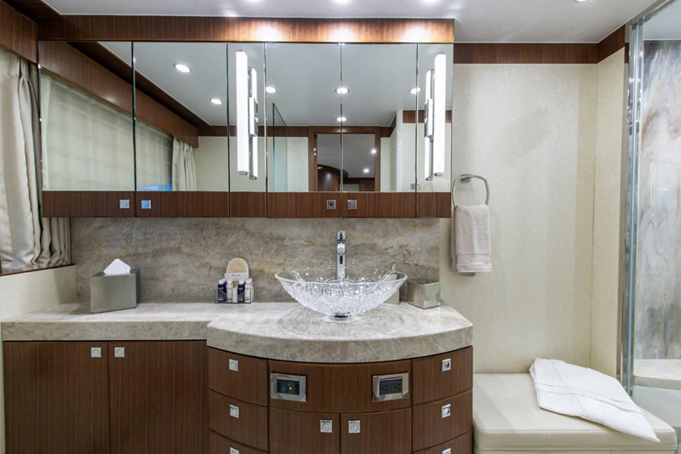 a bathroom with a sink and a mirror aboard G120 SIGNATURE SERIES Yacht for Sale