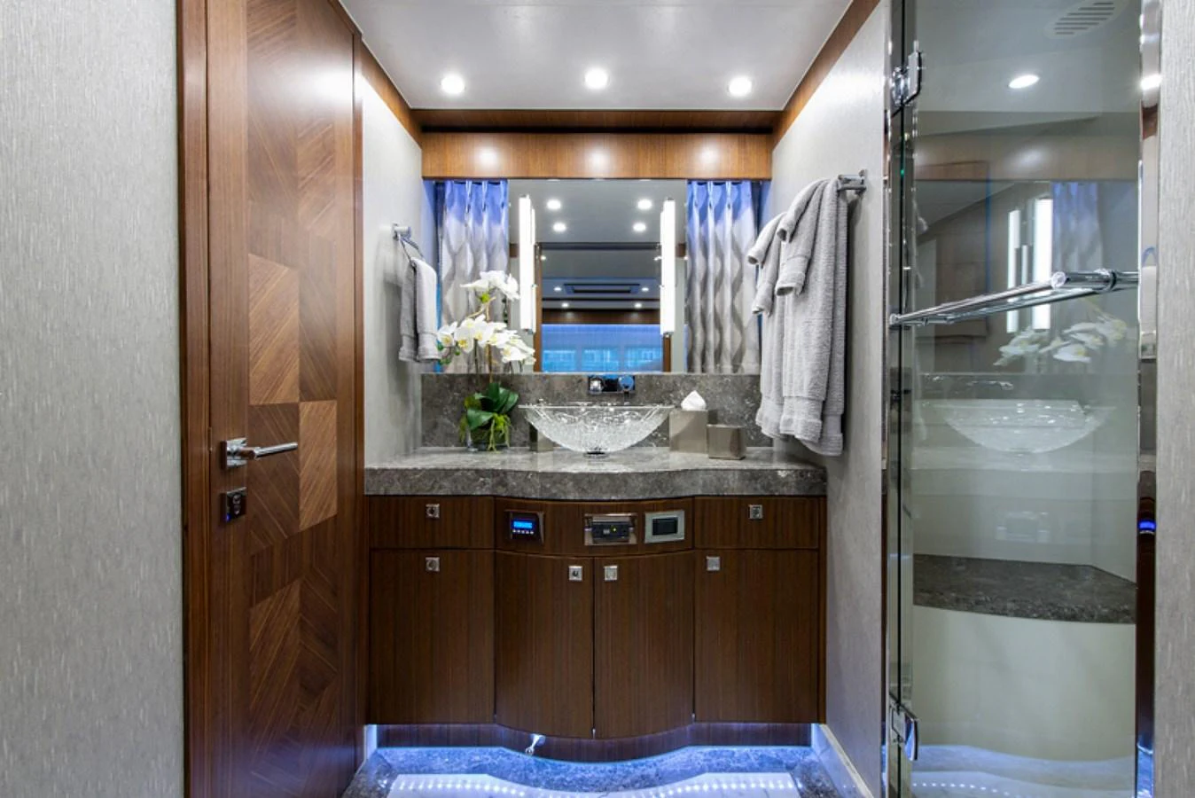 a bathroom with a sink and a mirror aboard G120 SIGNATURE SERIES Yacht for Sale