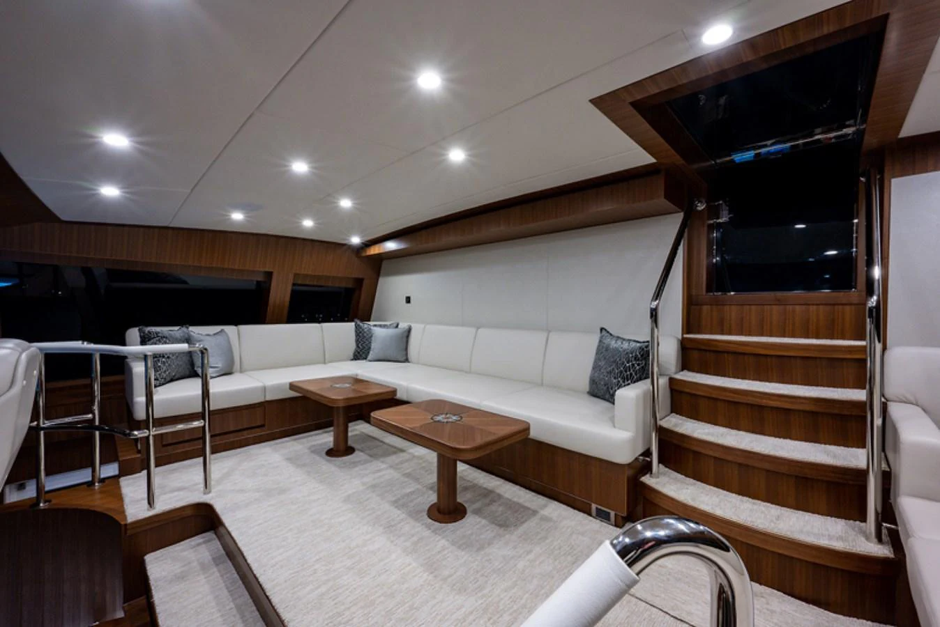 a living room with a couch and a table aboard G120 SIGNATURE SERIES Yacht for Sale