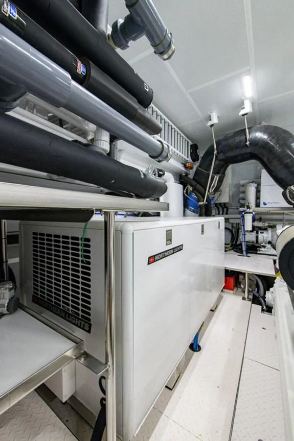 a machine in a room aboard G120 SIGNATURE SERIES Yacht for Sale