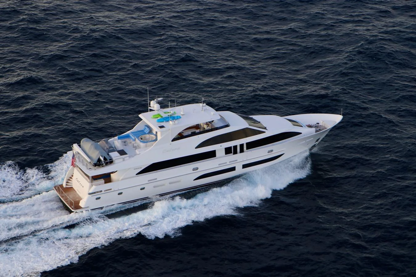 a white yacht in the water aboard G120 SIGNATURE SERIES Yacht for Sale