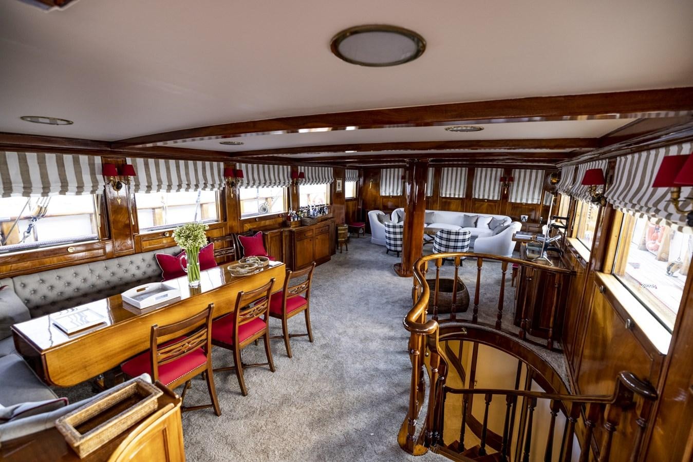 a room with tables and chairs aboard FRANCESCO PETRARCA Yacht for Sale