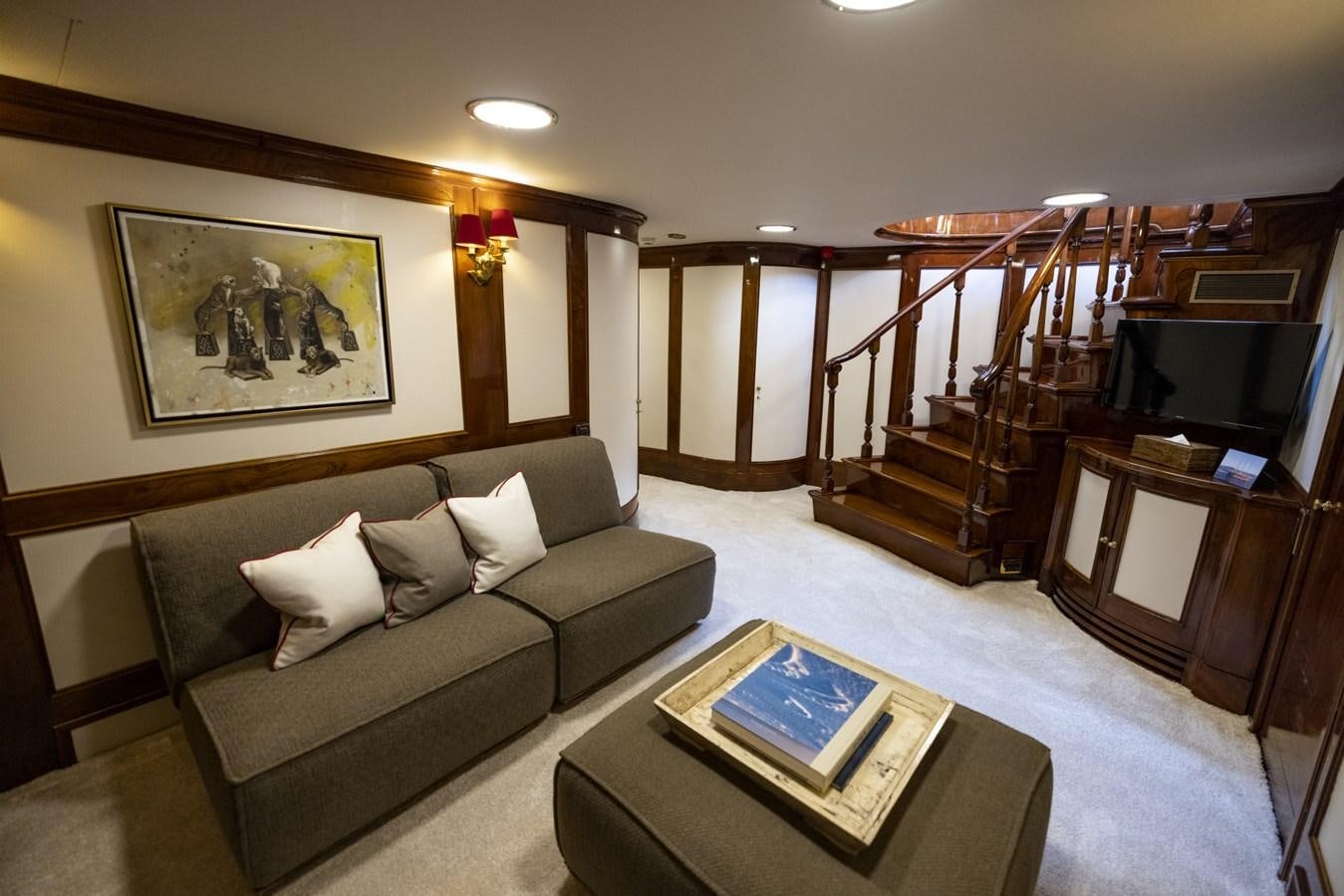 a living room with a couch and a coffee table aboard FRANCESCO PETRARCA Yacht for Sale