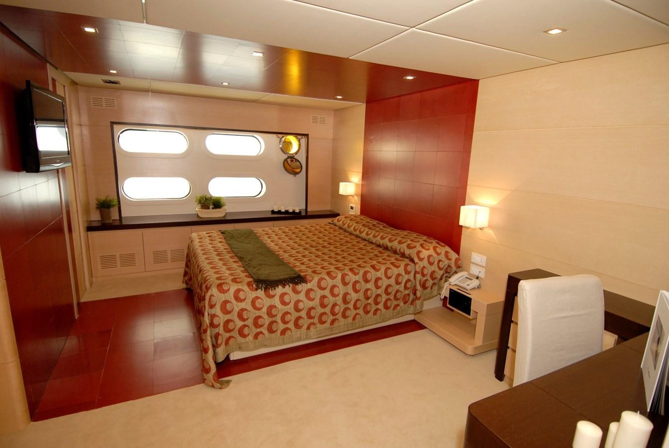 a hotel room with a bed and desk aboard C. BOAT 27 SC Yacht for Sale