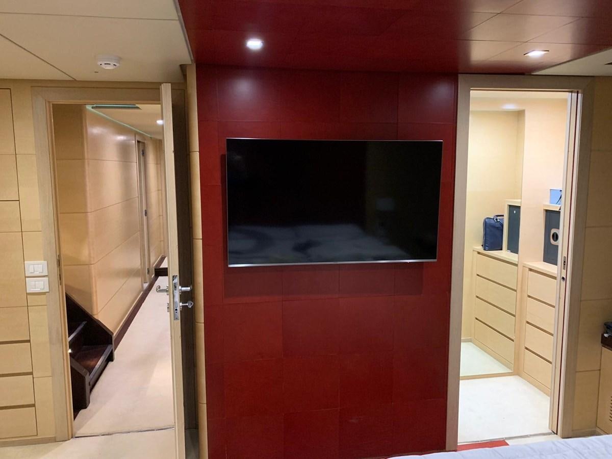 a room with a tv and a door aboard C. BOAT 27 SC Yacht for Sale