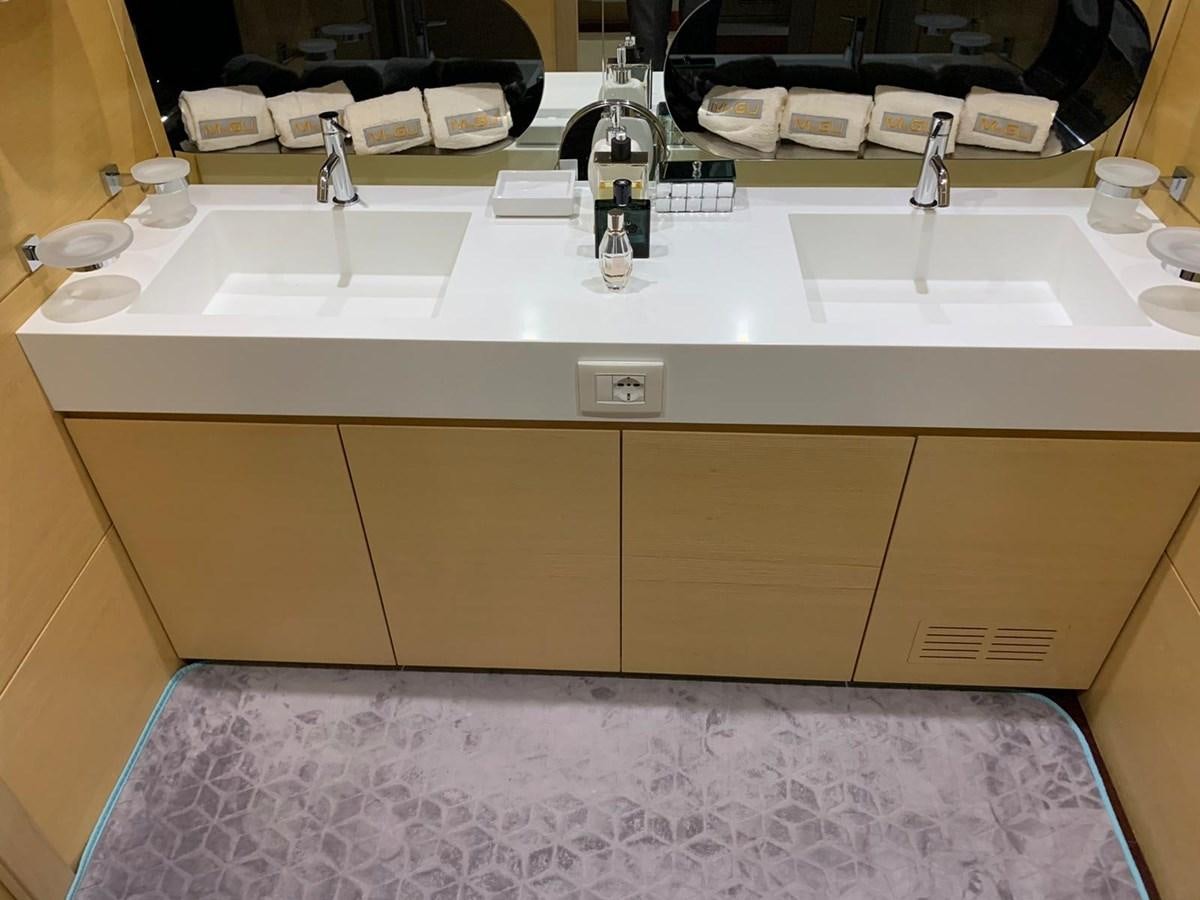 a bathroom with a sink and a mirror aboard C. BOAT 27 SC Yacht for Sale