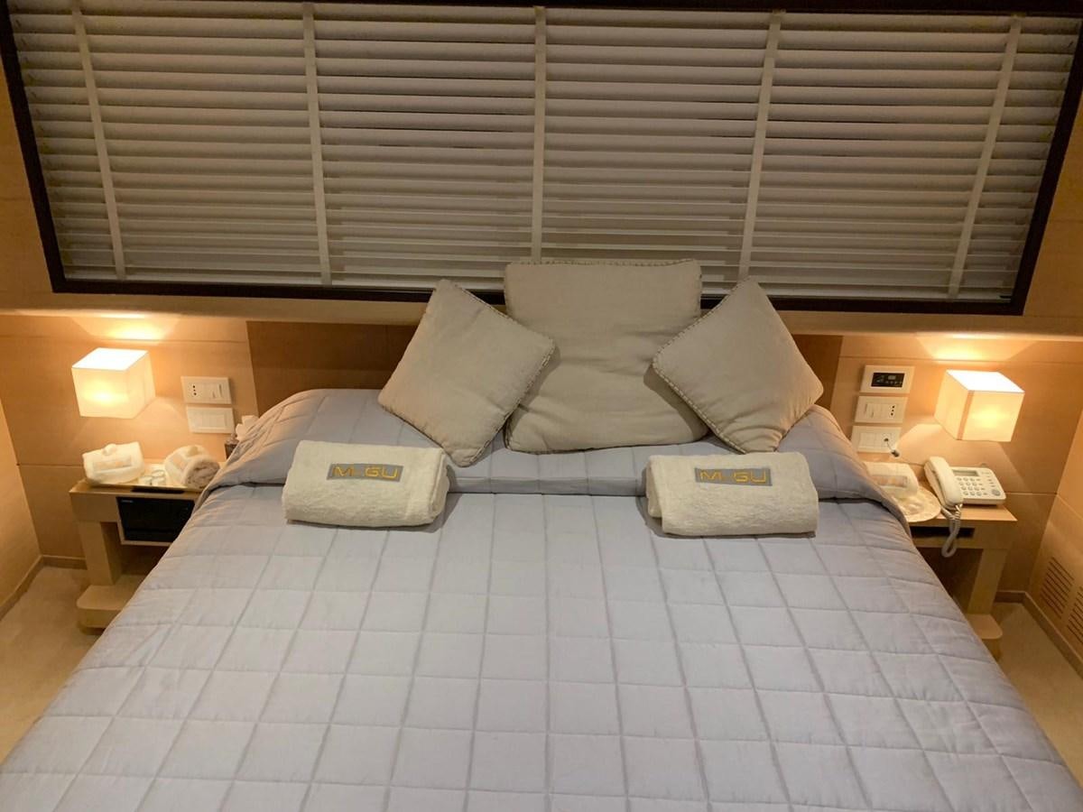 a bed with pillows and pillows aboard C. BOAT 27 SC Yacht for Sale