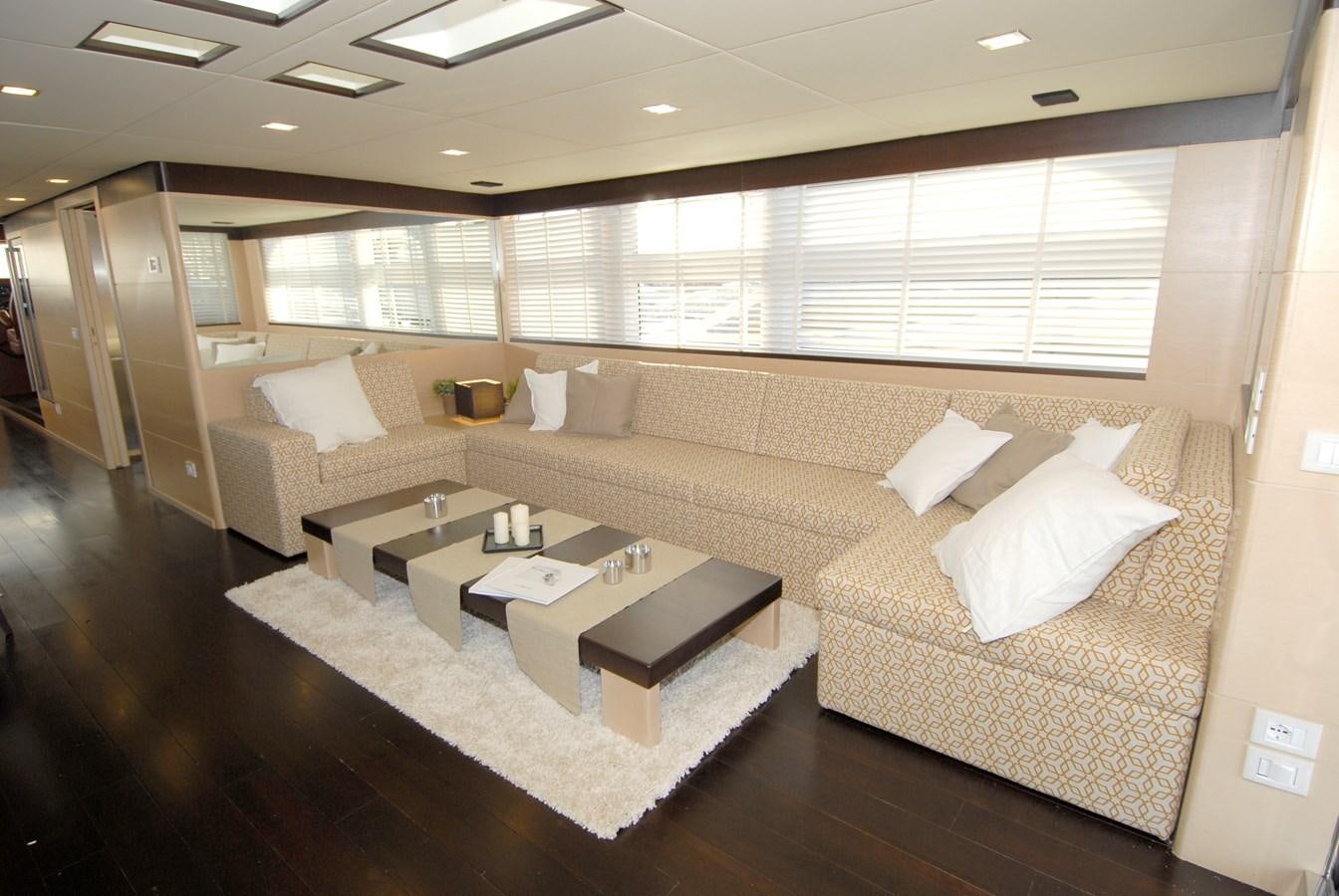 a room with a couch and coffee table aboard C. BOAT 27 SC Yacht for Sale