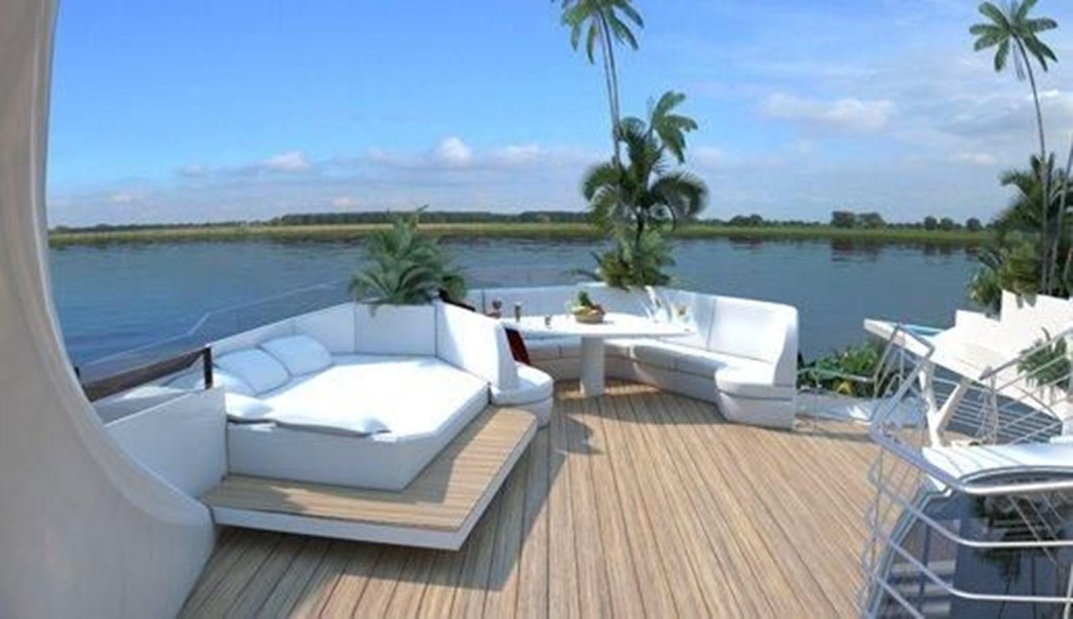 a white lounge chair on a wooden deck overlooking a tropical beach aboard 2020 ORION ORSOS ISLAND Yacht for Sale