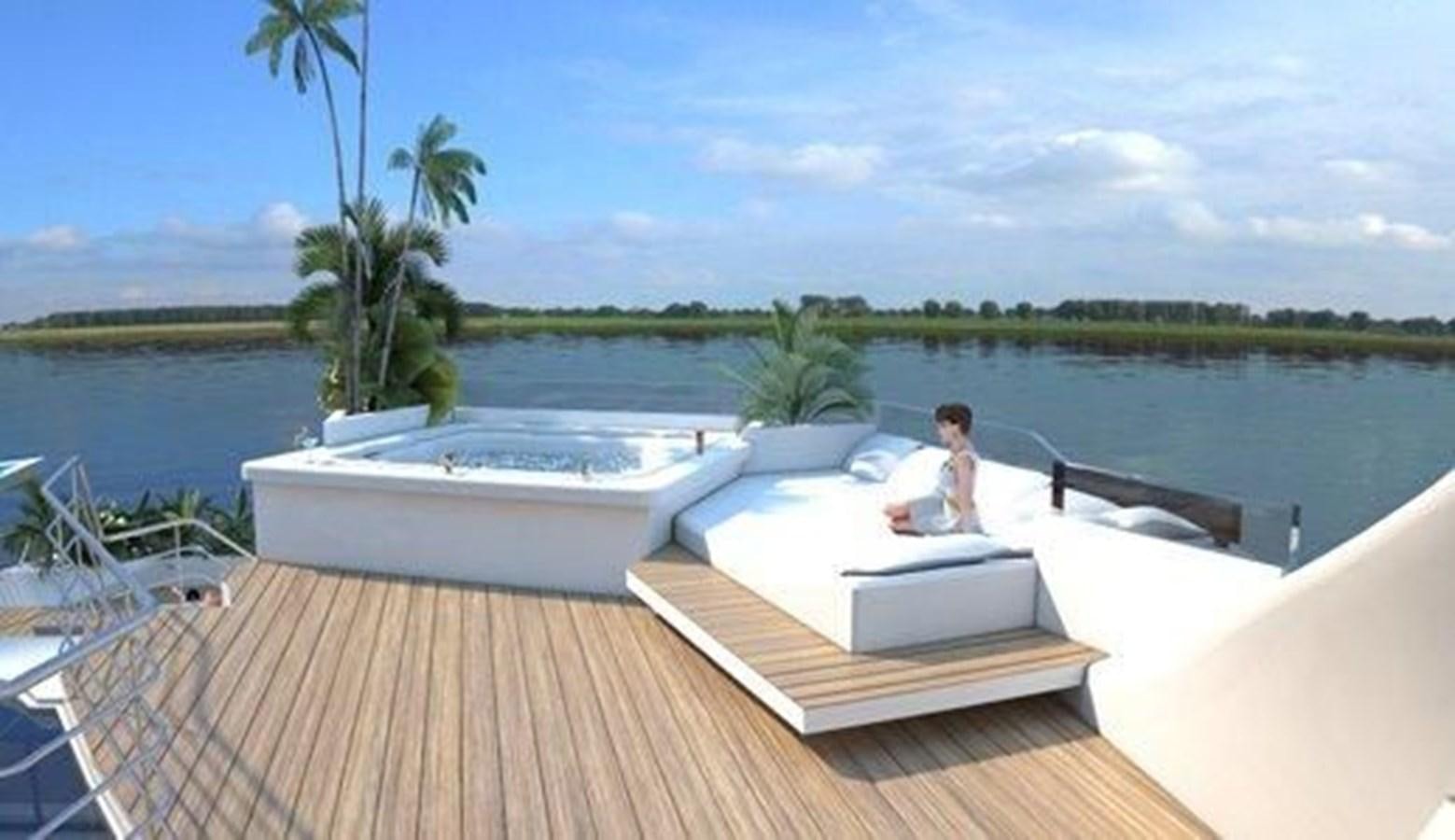 a person sitting in a white boat on a dock aboard 2020 ORION ORSOS ISLAND Yacht for Sale