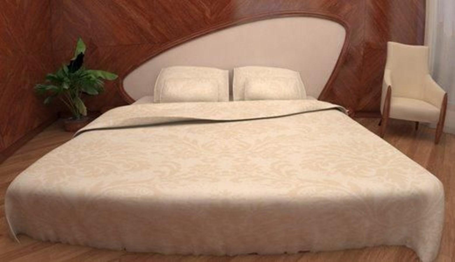 a bed with a white pillow aboard 2020 ORION ORSOS ISLAND Yacht for Sale