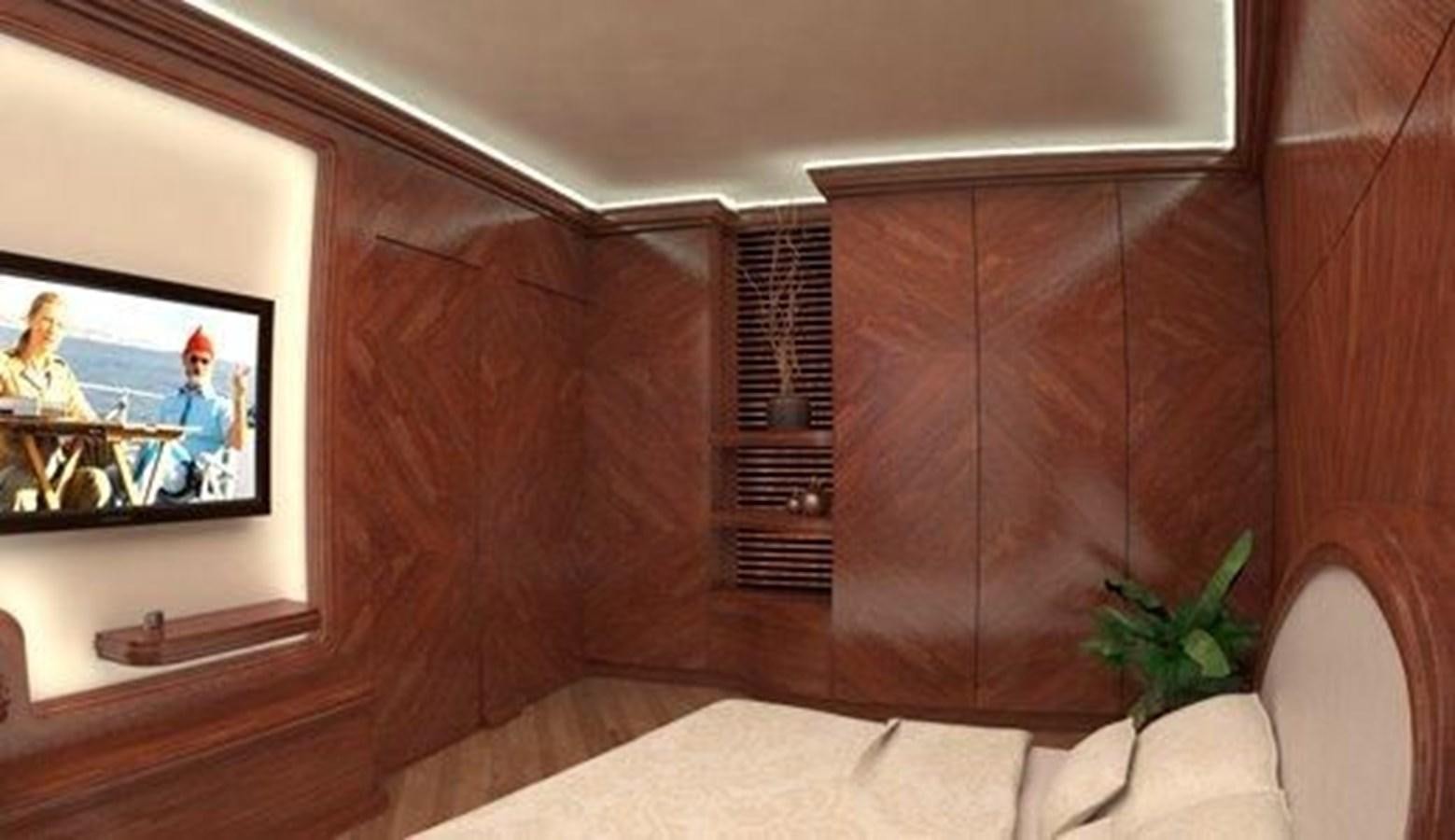 a room with a television and a chair aboard 2020 ORION ORSOS ISLAND Yacht for Sale