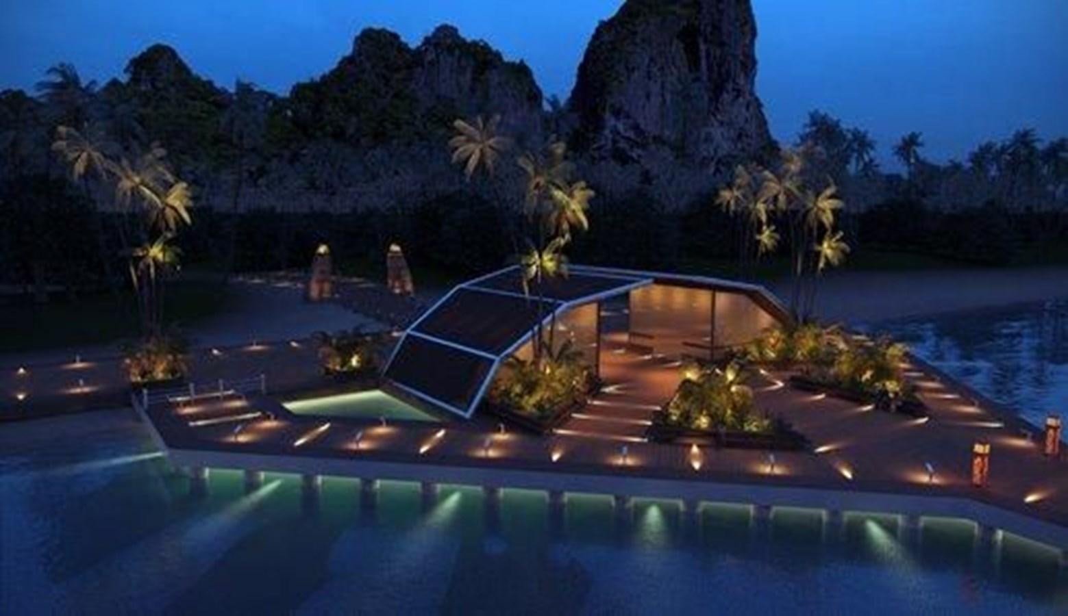 a swimming pool with a building in the background aboard 2020 ORION ORSOS ISLAND Yacht for Sale